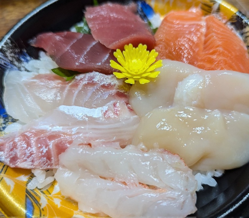 Kaisendon seafood rice bowl topped with tuna, salmon, white fish, and shellfish